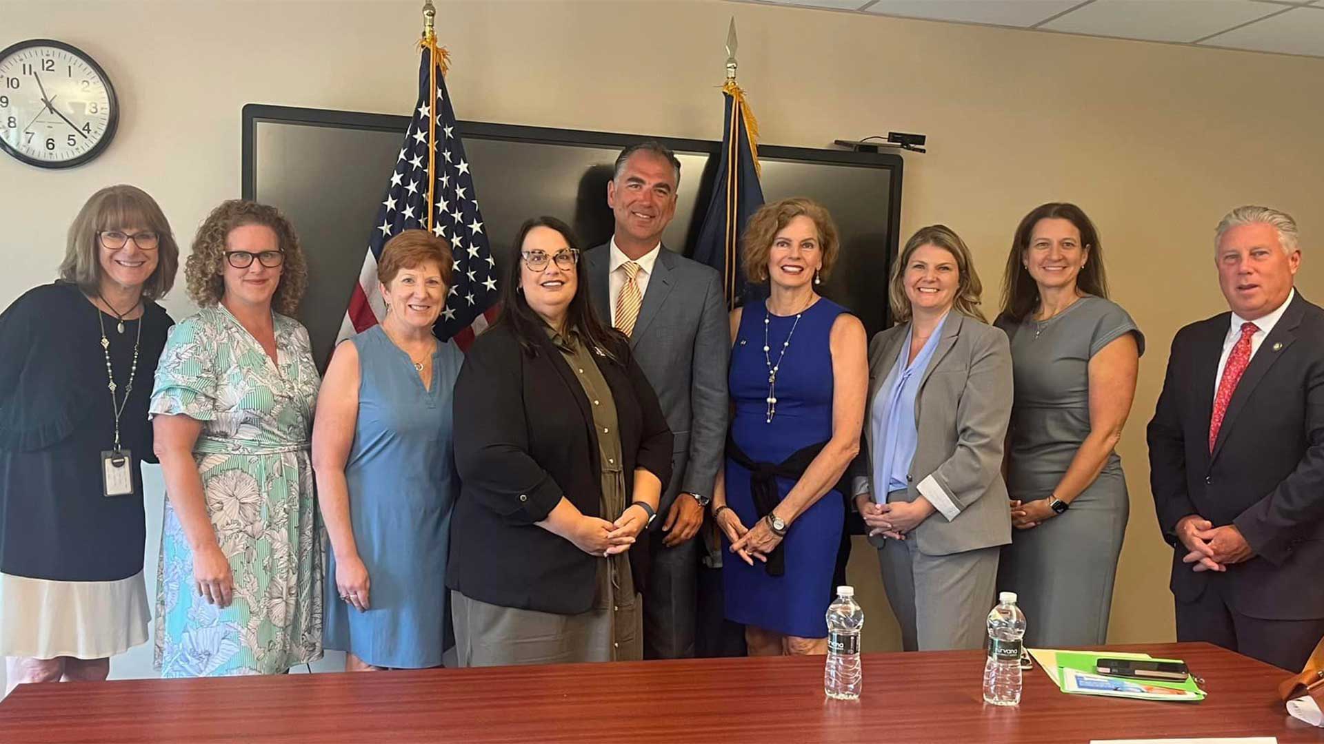 NYSUT President Melinda Person stands alongside elected officials, leaders from NYSUT locals, including Guilderland and Schoharie Teachers Associations and school administrators following a roundtable discussion with Governor Kathy Hochul on phone and social media use in schools.